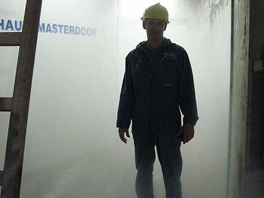 csm HAUX MASTERDOOR large tunnel air lock door system worker in front of door 572e4af463